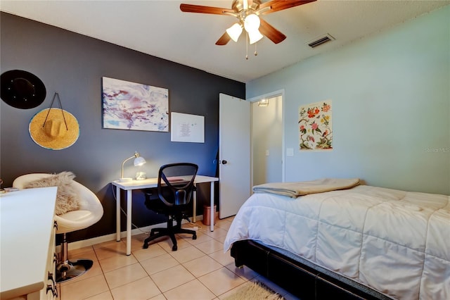 tiled bedroom with ceiling fan