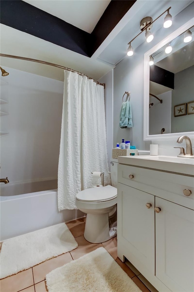 full bathroom with toilet, vanity, tile patterned floors, and shower / bathtub combination with curtain