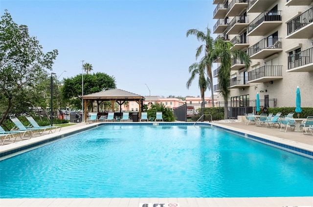 view of swimming pool with a gazebo