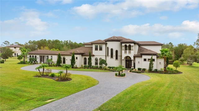 mediterranean / spanish-style house with a front lawn