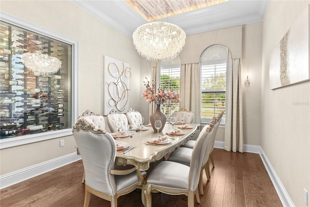 dining space featuring an inviting chandelier, dark hardwood / wood-style flooring, and crown molding