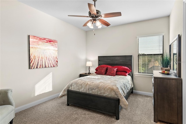 bedroom with light carpet and ceiling fan