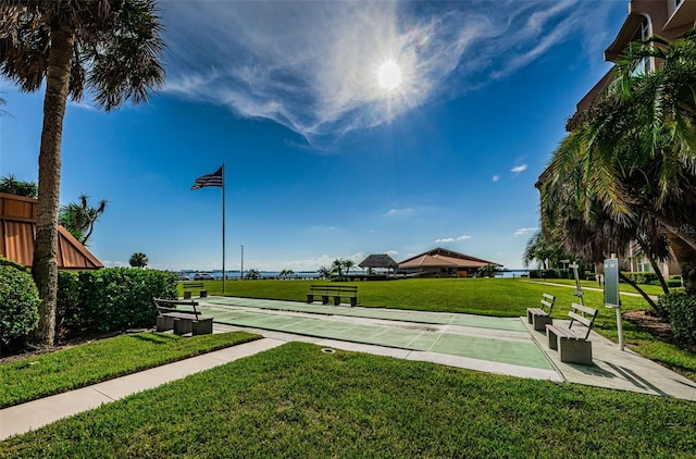 view of home's community featuring a yard