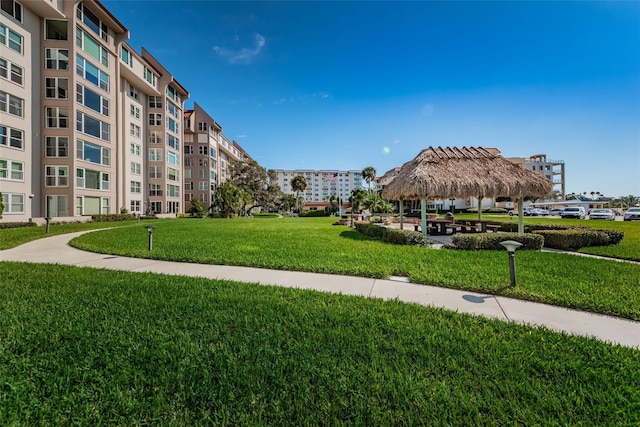 surrounding community with a gazebo and a lawn