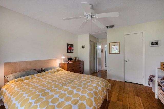 bedroom featuring a closet, ceiling fan, and hardwood / wood-style flooring