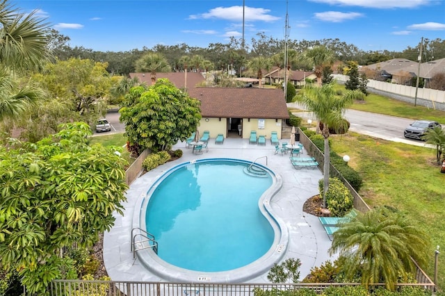 view of swimming pool with a patio