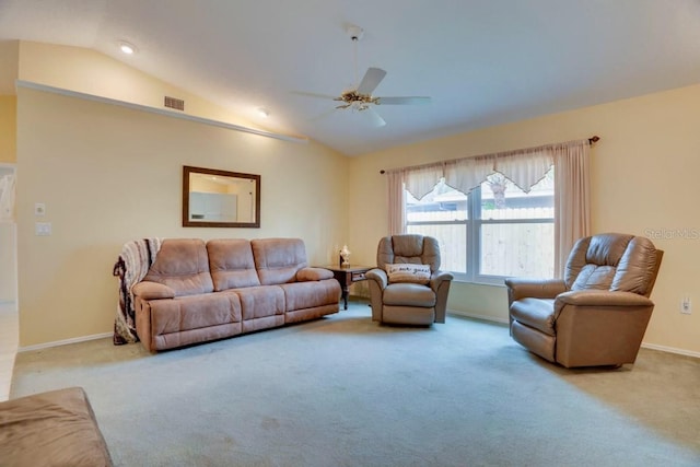 living area with visible vents, baseboards, carpet flooring, and vaulted ceiling