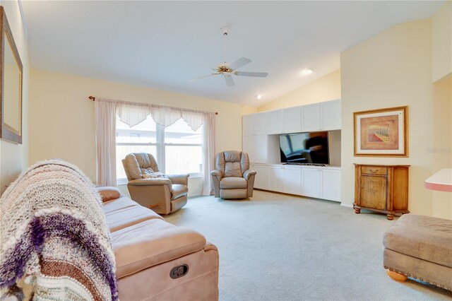 living room with light carpet, ceiling fan, and vaulted ceiling