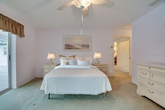 bedroom with visible vents, light carpet, access to exterior, baseboards, and ceiling fan