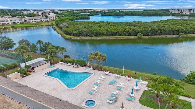 birds eye view of property featuring a water view