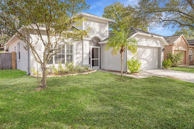 view of front facade featuring a front yard and a garage