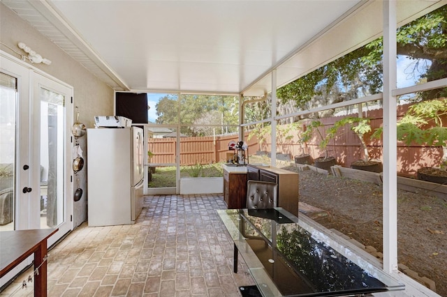 sunroom / solarium with french doors