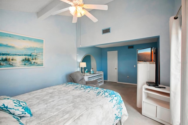 bedroom with ceiling fan, carpet, and lofted ceiling with beams