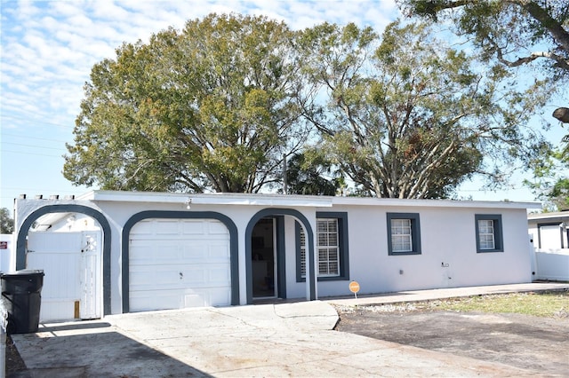 ranch-style home with a garage