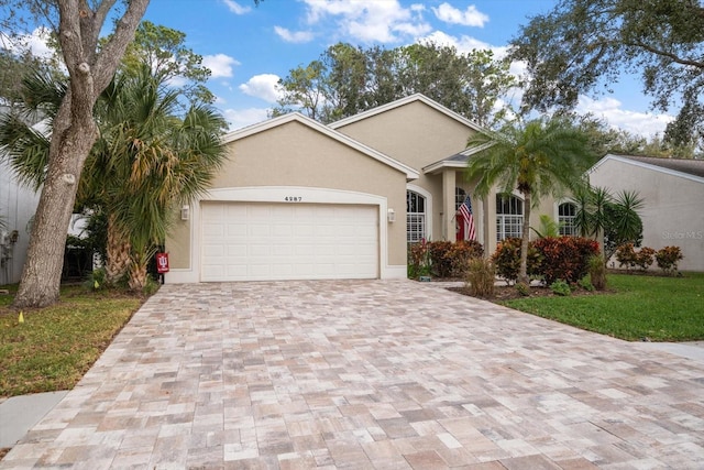 view of front of home with a garage