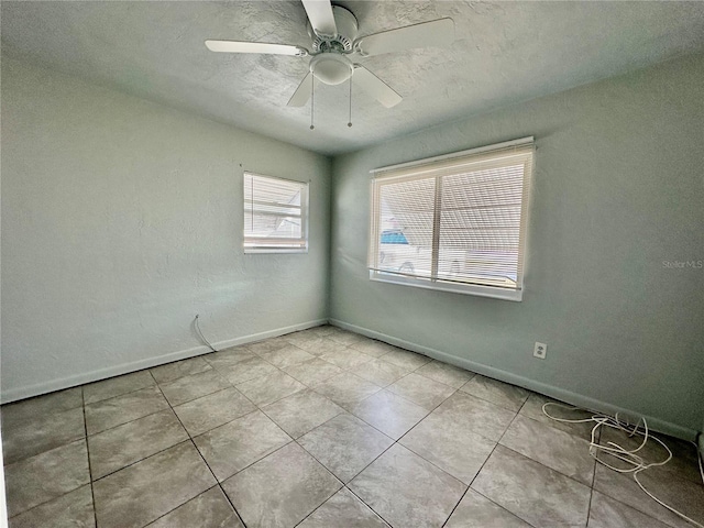 spare room featuring ceiling fan