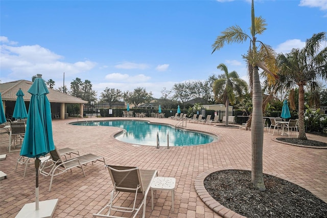 view of pool featuring a patio