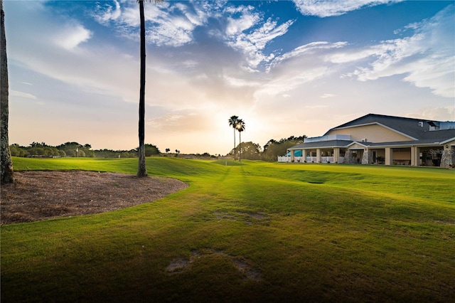 surrounding community featuring a yard