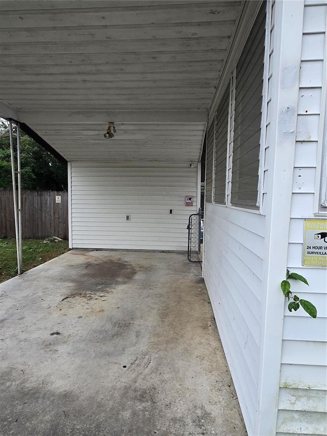 view of patio featuring a carport