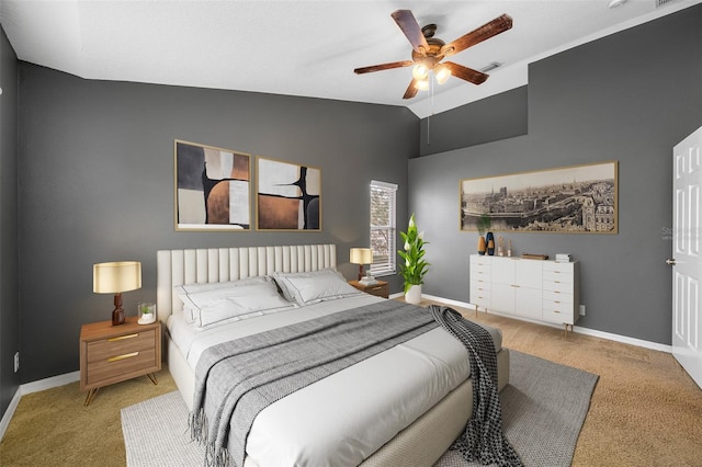 bedroom featuring ceiling fan, carpet flooring, and lofted ceiling