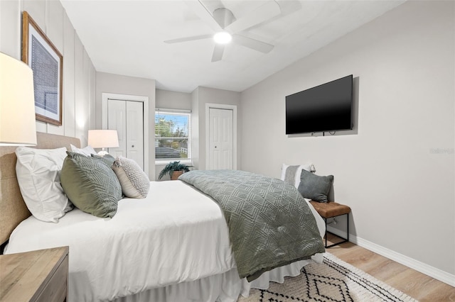 bedroom with ceiling fan and light hardwood / wood-style floors