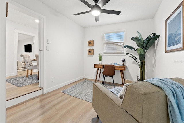 office area featuring light hardwood / wood-style floors and ceiling fan