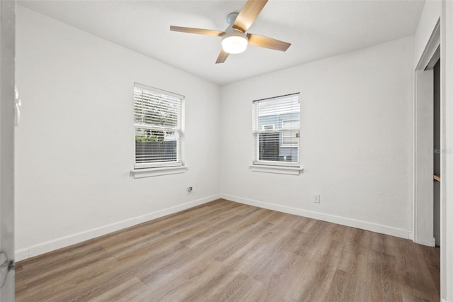 unfurnished bedroom featuring ceiling fan and light wood-type flooring