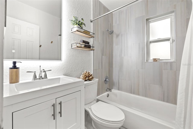 full bathroom featuring toilet, vanity, and shower / bath combo with shower curtain