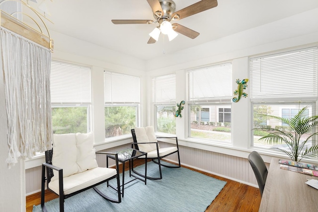 interior space featuring ceiling fan