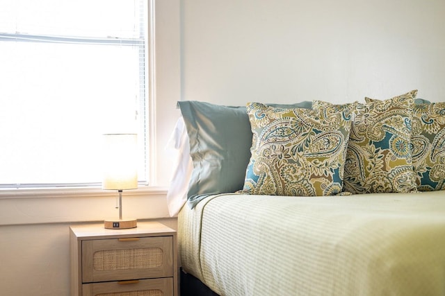 bedroom with multiple windows