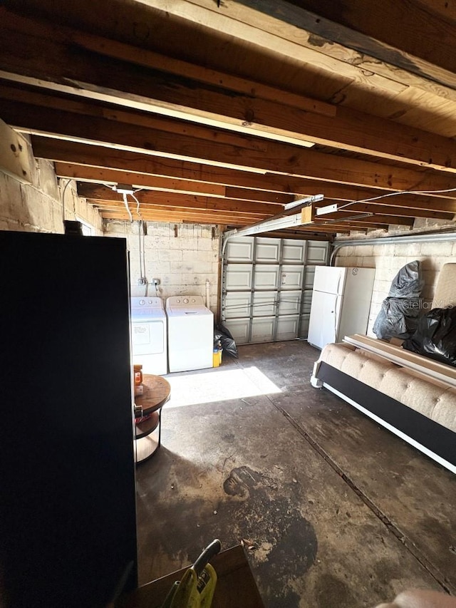 garage featuring washer and dryer