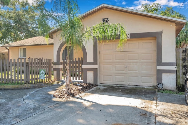 view of front of property featuring a garage