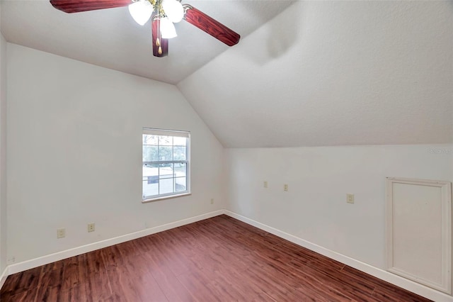 additional living space with lofted ceiling, wood-type flooring, and ceiling fan