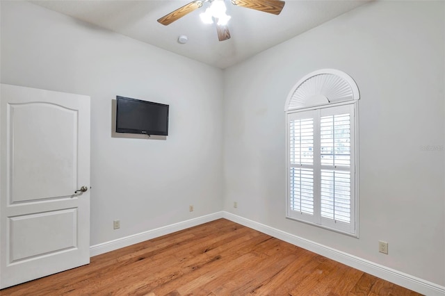 unfurnished room featuring ceiling fan and light hardwood / wood-style flooring