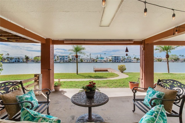 view of patio / terrace featuring a water view