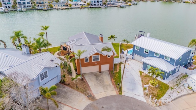 birds eye view of property featuring a water view