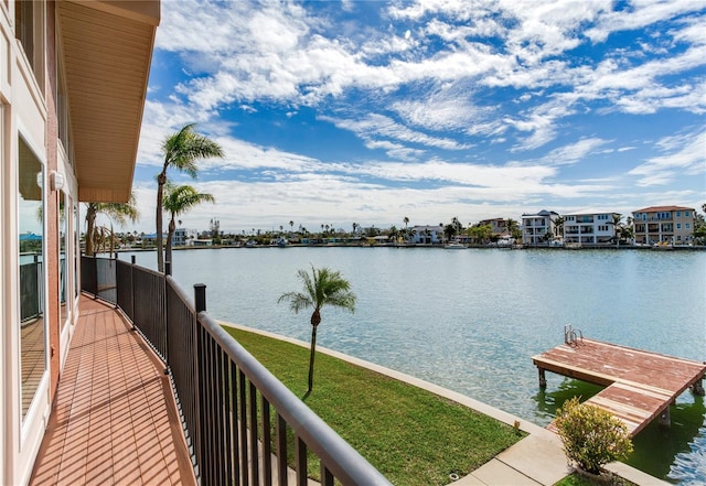 property view of water with a dock