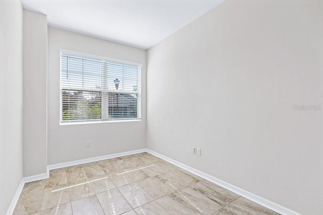 view of tiled empty room