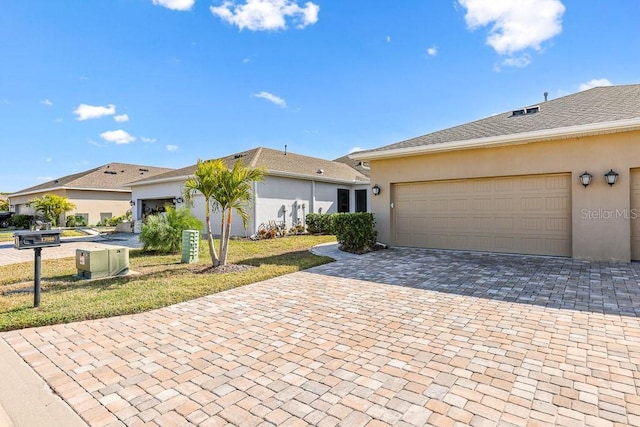 ranch-style home with a garage