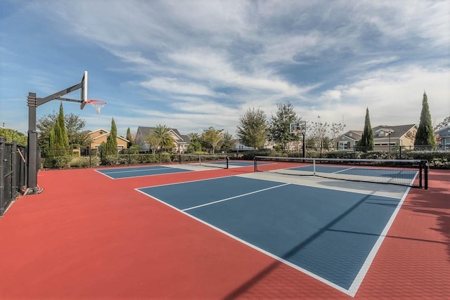 view of tennis court featuring basketball court