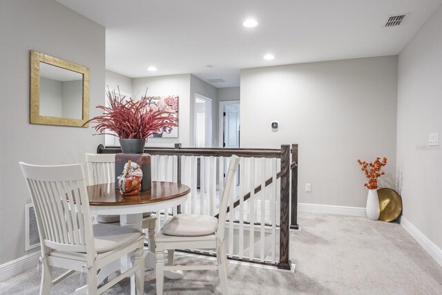 dining area with carpet flooring