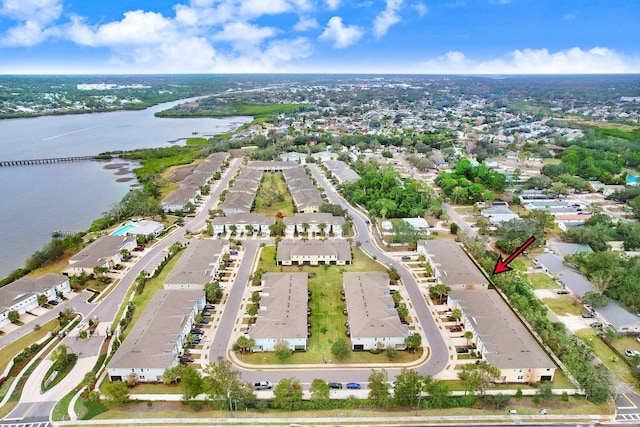 drone / aerial view with a water view