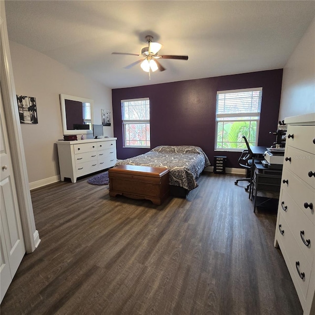 bedroom featuring ceiling fan and dark hardwood / wood-style flooring