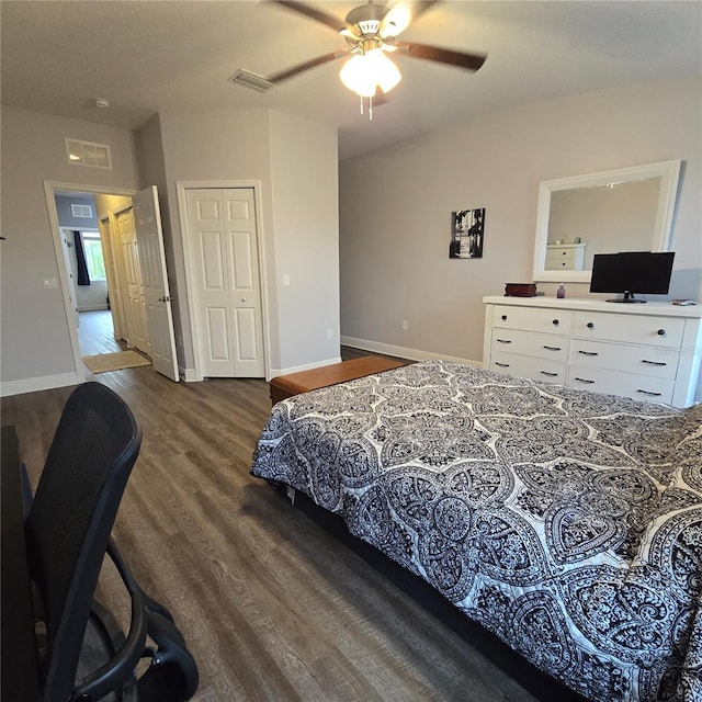 bedroom featuring ceiling fan and dark hardwood / wood-style floors