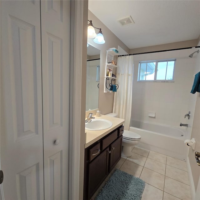 full bathroom with toilet, shower / bath combo, tile patterned flooring, and vanity