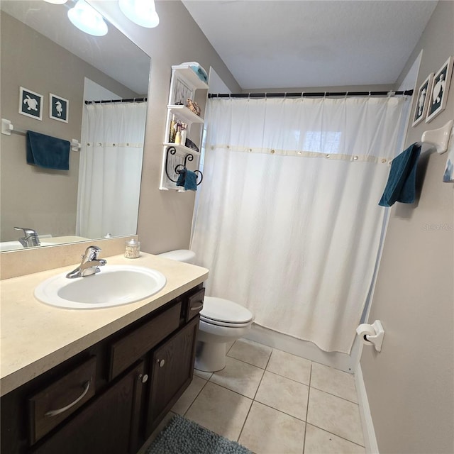 full bathroom with tile patterned flooring, vanity, shower / bath combination with curtain, and toilet