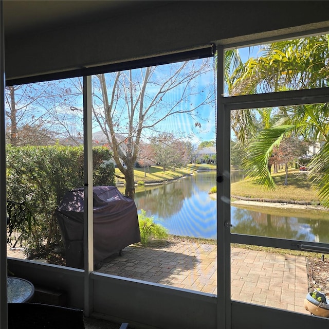 entryway featuring a water view