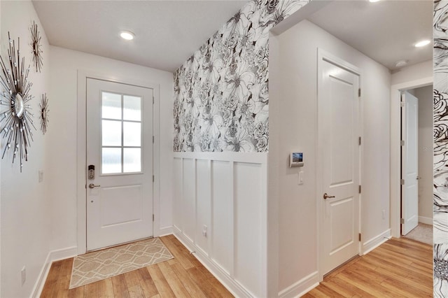 doorway with light hardwood / wood-style floors