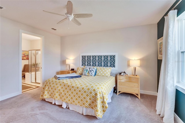 bedroom featuring ceiling fan and light carpet