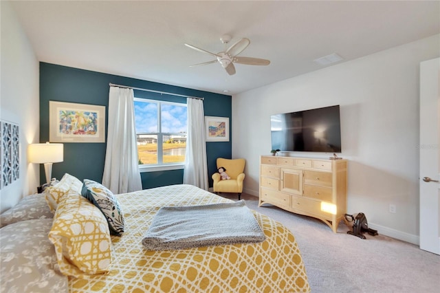 carpeted bedroom featuring ceiling fan